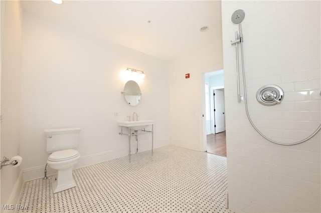 12 Lotus Ave, Chester, WV 26034 - bathroom featuring tiled shower and tile patterned floors