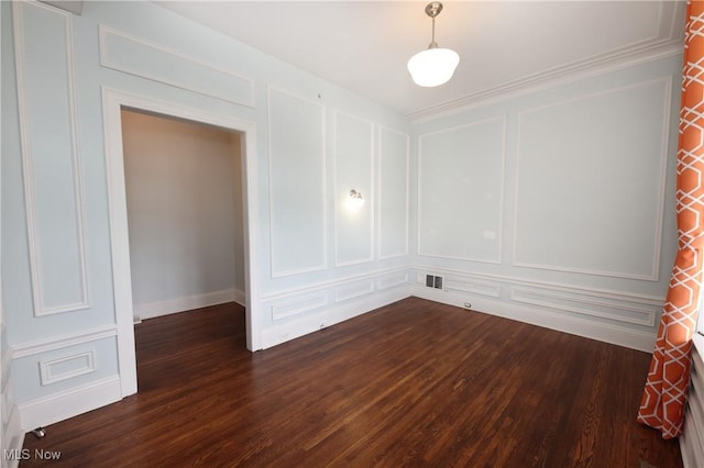 12 Lotus Ave, Chester, WV 26034 - unfurnished room with a decorative wall, dark wood-style flooring, and ornamental molding