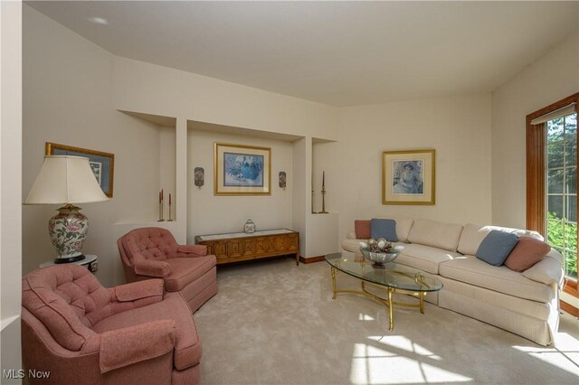 1110 Mansion Dr, Barberton, OH 44203 - living room featuring light carpet