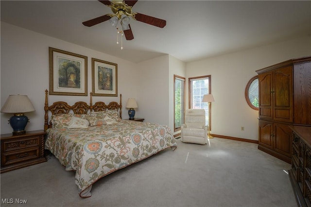 1110 Mansion Dr, Barberton, OH 44203 - carpeted bedroom featuring baseboards and a ceiling fan
