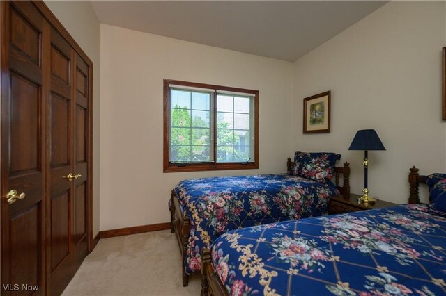 1110 Mansion Dr, Barberton, OH 44203 - bedroom with light carpet and baseboards