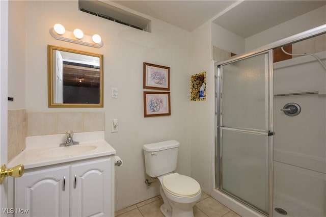 1110 Mansion Dr, Barberton, OH 44203 - bathroom featuring vanity, tile patterned flooring, and a shower with shower door