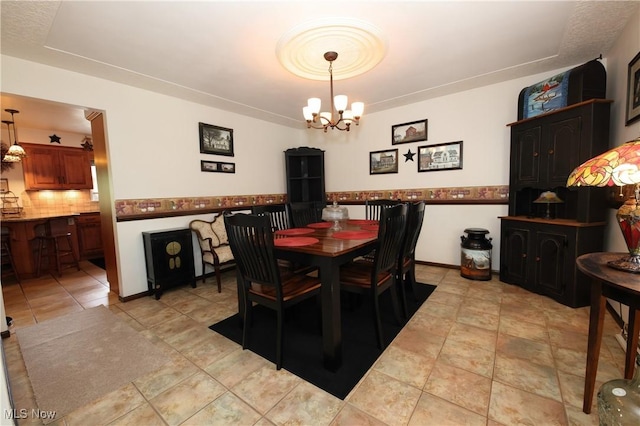 27 Robinson Ln, Weirton, WV 26062 - dining room featuring a chandelier and light tile patterned floors