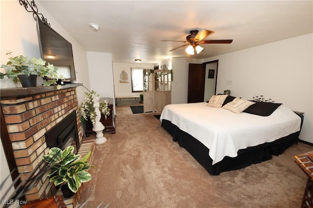 27 Robinson Ln, Weirton, WV 26062 - carpeted bedroom with a brick fireplace