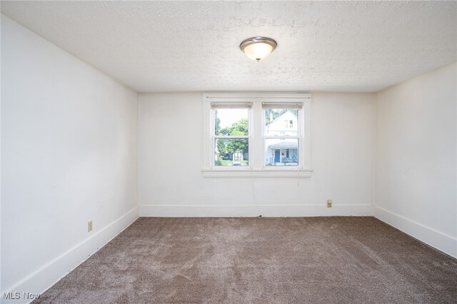 1333 Meriline St, Cuyahoga Falls, OH 44221 - spare room featuring carpet and a textured ceiling
