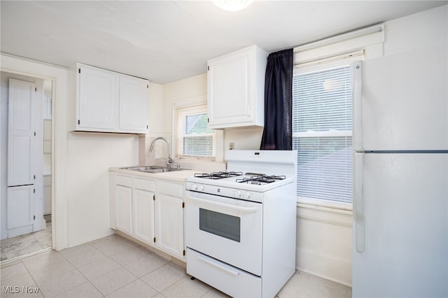 1333 Meriline St, Cuyahoga Falls, OH 44221 - kitchen featuring white appliances, white cabinets, and light countertops