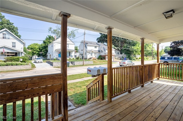 1333 Meriline St, Cuyahoga Falls, OH 44221 - wooden porch with a residential view