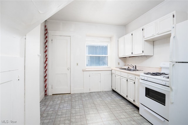 1333 Meriline St, Cuyahoga Falls, OH 44221 - kitchen with white appliances, white cabinets, light countertops, and light floors
