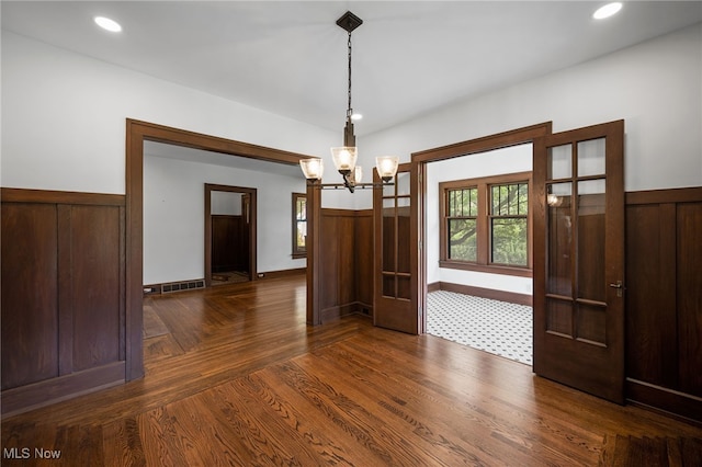 159 Edgerton Rd, Akron, OH 44303 - unfurnished dining area featuring wainscoting, a chandelier, dark wood-type flooring, and recessed lighting