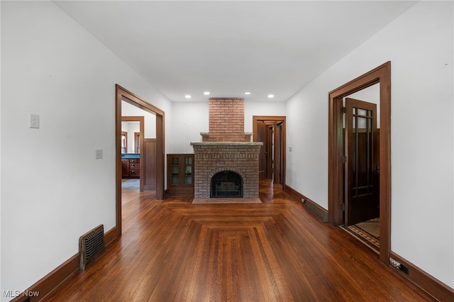 159 Edgerton Rd, Akron, OH 44303 - unfurnished living room featuring a brick fireplace, recessed lighting, and parquet floors