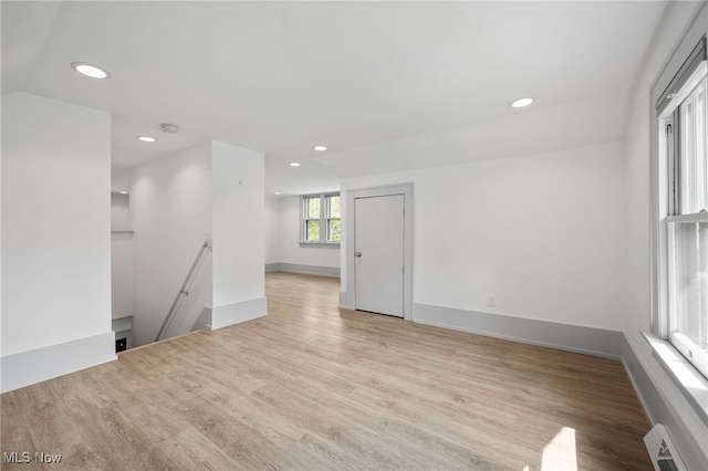159 Edgerton Rd, Akron, OH 44303 - spare room featuring recessed lighting, wood finished floors, a baseboard heating unit, and lofted ceiling