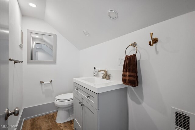 159 Edgerton Rd, Akron, OH 44303 - half bath with vaulted ceiling, vanity, wood finished floors, and recessed lighting