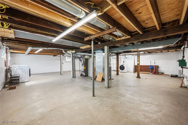 159 Edgerton Rd, Akron, OH 44303 - unfinished below grade area featuring separate washer and dryer and gas water heater