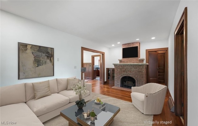 159 Edgerton Rd, Akron, OH 44303 - living area with wood finished floors, recessed lighting, and a fireplace