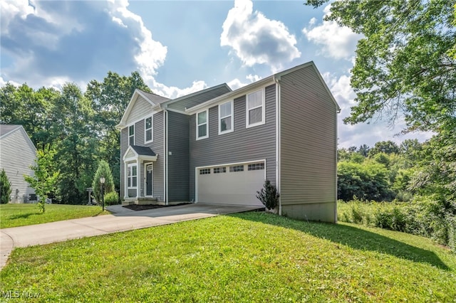 301 Karson Dr, Akron, OH 44312 - traditional-style home with a garage, driveway, and a front lawn