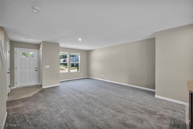 301 Karson Dr, Akron, OH 44312 - entrance foyer featuring carpet floors and baseboards