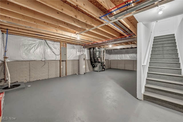301 Karson Dr, Akron, OH 44312 - unfinished basement with electric water heater, electric panel, stairway, and heating unit