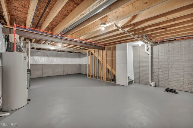 301 Karson Dr, Akron, OH 44312 - unfinished basement with water heater and stairway