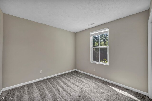 301 Karson Dr, Akron, OH 44312 - carpeted empty room featuring baseboards