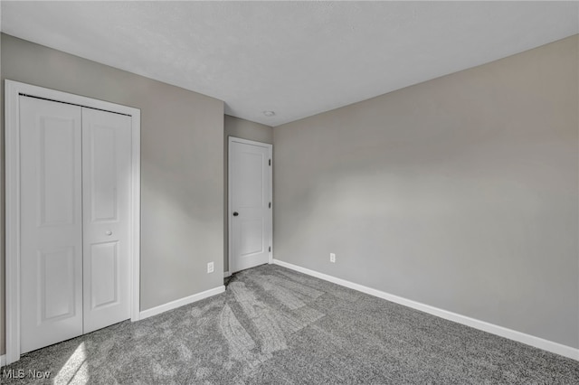 301 Karson Dr, Akron, OH 44312 - unfurnished bedroom with carpet flooring and a closet