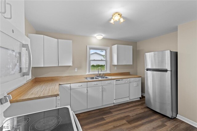 60880 Webb Heights Rd, Shadyside, OH 43947 - kitchen featuring white appliances, white cabinetry, and dark wood-type flooring