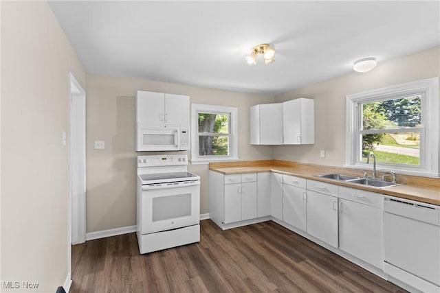 60880 Webb Heights Rd, Shadyside, OH 43947 - kitchen with white appliances, dark wood finished floors, light countertops, and white cabinets