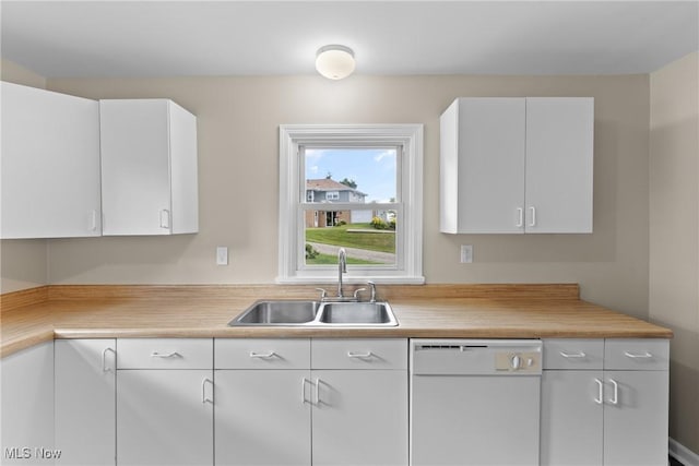 60880 Webb Heights Rd, Shadyside, OH 43947 - kitchen with dishwasher, light countertops, and white cabinets