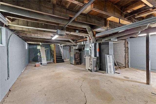 60880 Webb Heights Rd, Shadyside, OH 43947 - unfinished basement featuring stairway and heating unit