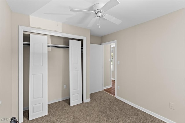60880 Webb Heights Rd, Shadyside, OH 43947 - unfurnished bedroom with carpet flooring, a closet, and a ceiling fan