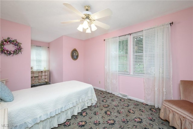 3043 E Wallings Rd, Broadview Heights, OH 44147 - carpeted bedroom with baseboards and a ceiling fan