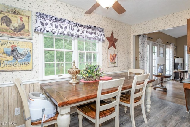 3043 E Wallings Rd, Broadview Heights, OH 44147 - dining room with wallpapered walls, wainscoting, ceiling fan, and wood finished floors