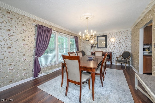 3043 E Wallings Rd, Broadview Heights, OH 44147 - dining space featuring a chandelier, wallpapered walls, wood finished floors, and ornamental molding