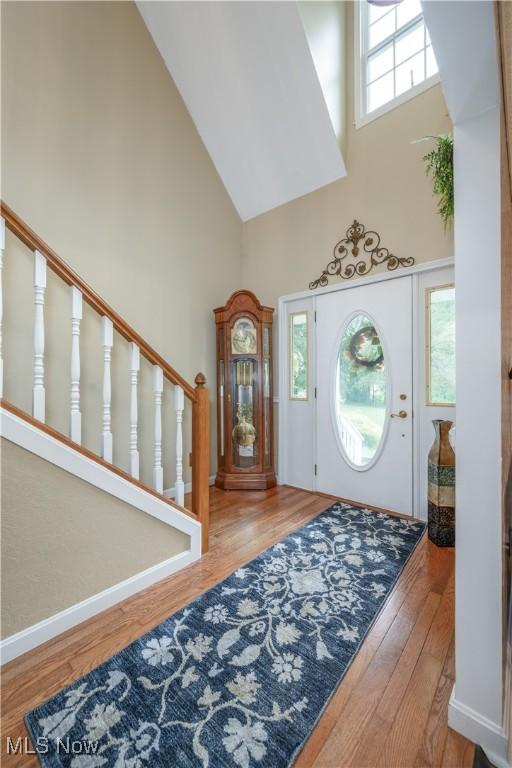 3043 E Wallings Rd, Broadview Heights, OH 44147 - entryway with high vaulted ceiling and wood finished floors