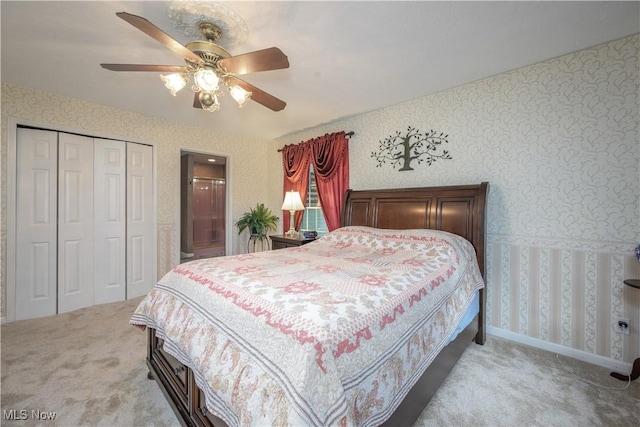 3043 E Wallings Rd, Broadview Heights, OH 44147 - carpeted bedroom with wallpapered walls, a closet, ceiling fan, and connected bathroom