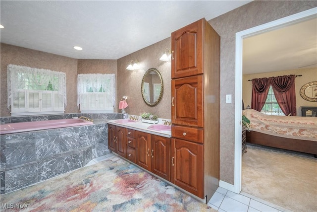 3043 E Wallings Rd, Broadview Heights, OH 44147 - bathroom with healthy amount of natural light, tile patterned flooring, double vanity, and a bath