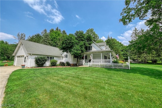 3043 E Wallings Rd, Broadview Heights, OH 44147 - country-style home featuring a porch, a garage, concrete driveway, and a front yard
