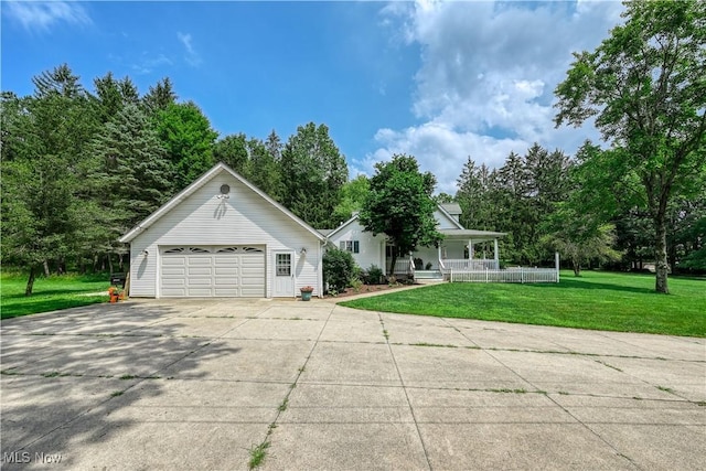 3043 E Wallings Rd, Broadview Heights, OH 44147 - view of front facade featuring covered porch, a garage, a front yard, and view of scattered trees