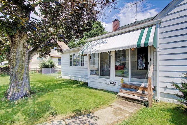 1648 Frederick Ave SW, Canton, OH 44706 - entrance to property featuring a chimney