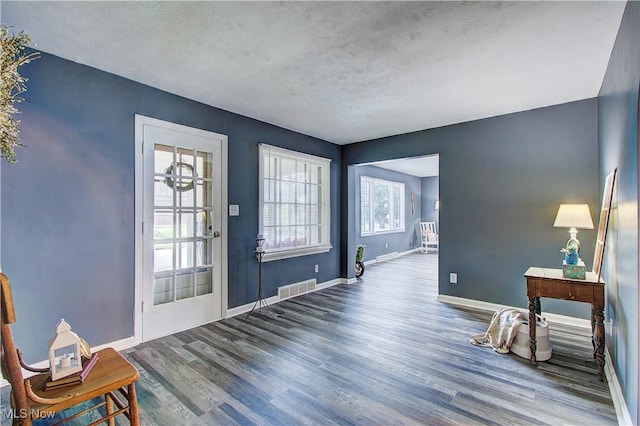 1648 Frederick Ave SW, Canton, OH 44706 - foyer featuring wood finished floors and a textured ceiling