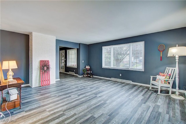 1648 Frederick Ave SW, Canton, OH 44706 - living room featuring wood finished floors and baseboards