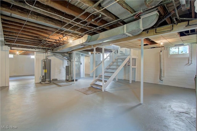 1648 Frederick Ave SW, Canton, OH 44706 - basement with water heater, stairway, and heating unit