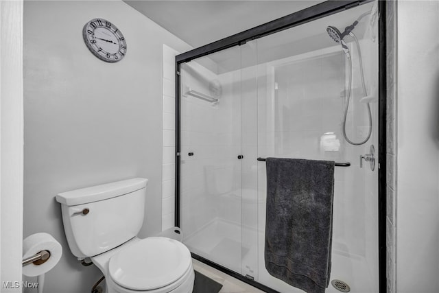 255 Portage Lakes Dr Unit E, Akron, OH 44319 - bathroom featuring toilet and a stall shower