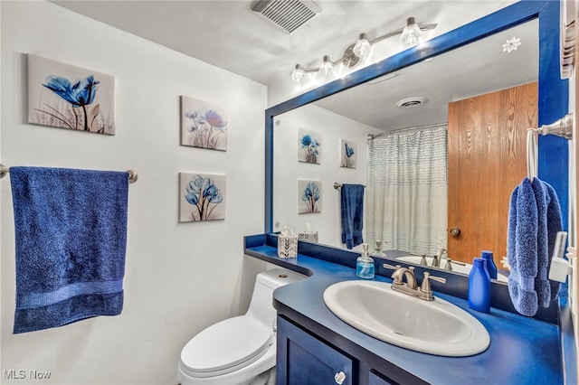 255 Portage Lakes Dr Unit E, Akron, OH 44319 - bathroom with vanity and curtained shower