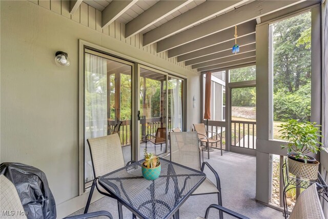 255 Portage Lakes Dr Unit E, Akron, OH 44319 - sunroom with beamed ceiling