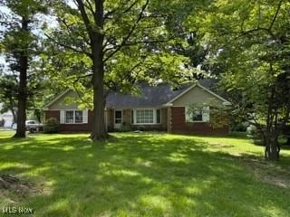 1200 Som Center Rd, Mayfield Heights, OH 44124 - single story home featuring a front lawn