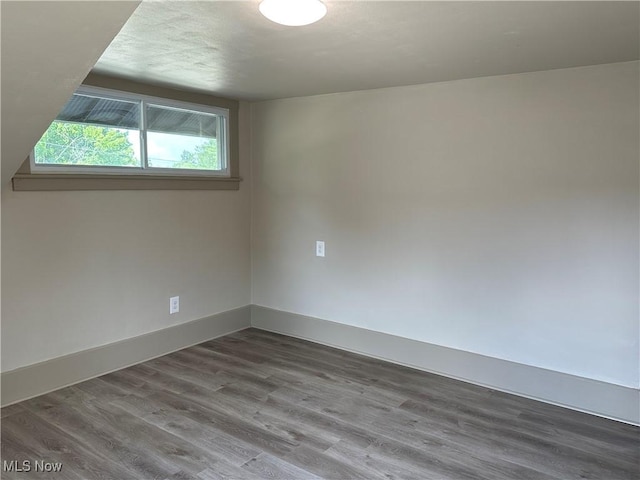 26 E Satin St, Jefferson, OH 44047 - unfurnished room with wood finished floors and baseboards