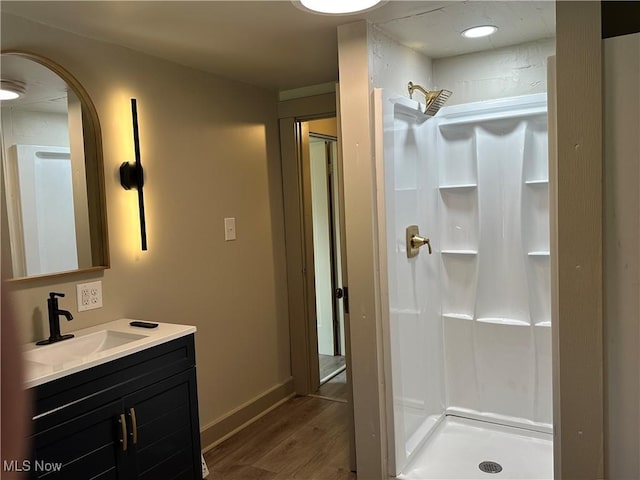 26 E Satin St, Jefferson, OH 44047 - full bath with wood finished floors, a stall shower, and vanity