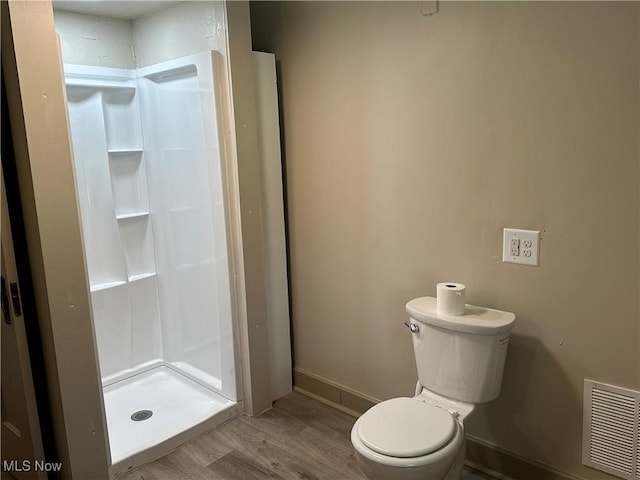 26 E Satin St, Jefferson, OH 44047 - bathroom with a shower stall and wood finished floors