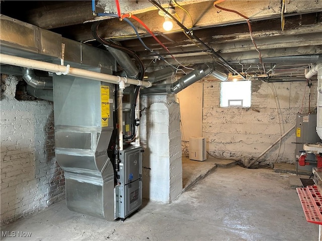 26 E Satin St, Jefferson, OH 44047 - below grade area featuring heating unit and water heater