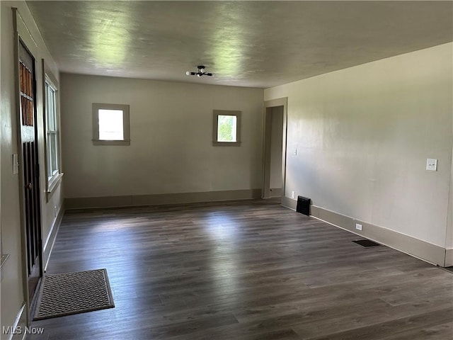 26 E Satin St, Jefferson, OH 44047 - empty room with dark wood-type flooring